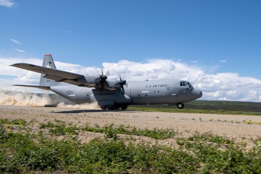 C-130s weave through mountains, perform dirt strip landings for RED FLAG 22-2