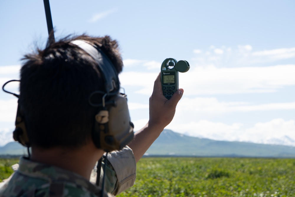 C-130s weave through mountains, perform dirt strip landings for RED FLAG 22-2