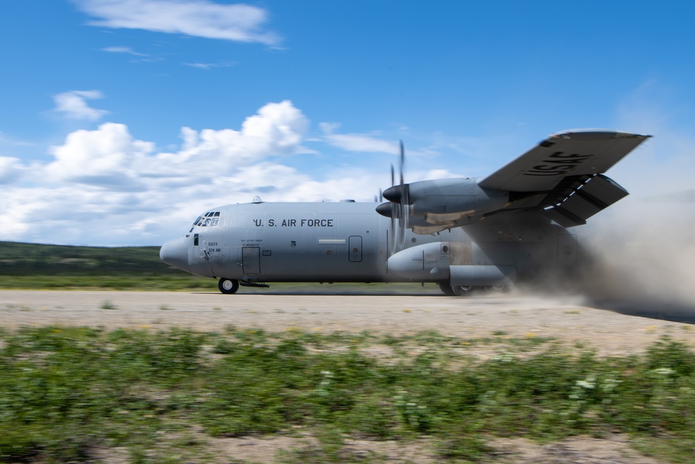 C-130s weave through mountains, perform dirt strip landings for RED FLAG 22-2