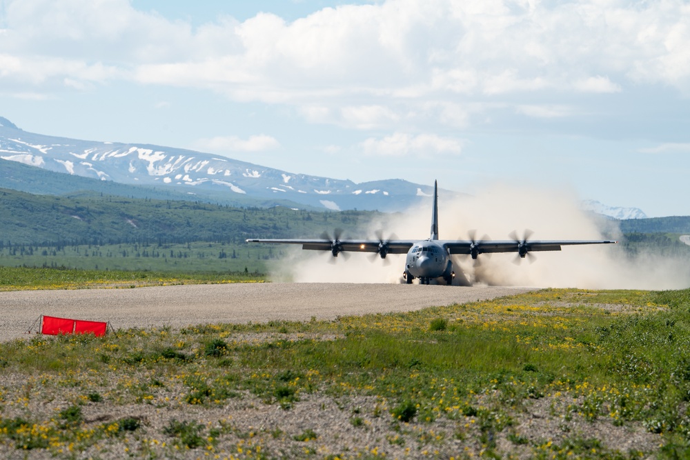 C-130s weave through mountains, perform dirt strip landings for RED FLAG 22-2