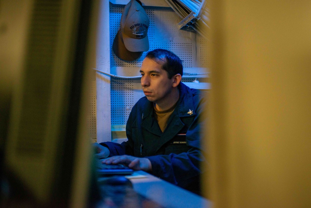 USS Ronald Reagan (CVN 76) Sailors work and relax in CRMD spaces