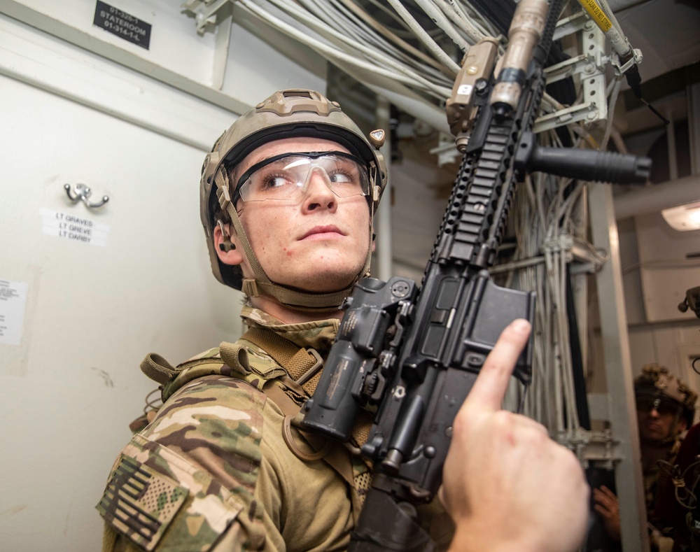 Sailors from USS Abraham Lincoln Conduct a Helicopter Visit, Board, Search and Seizure Exercise with USS Dewey