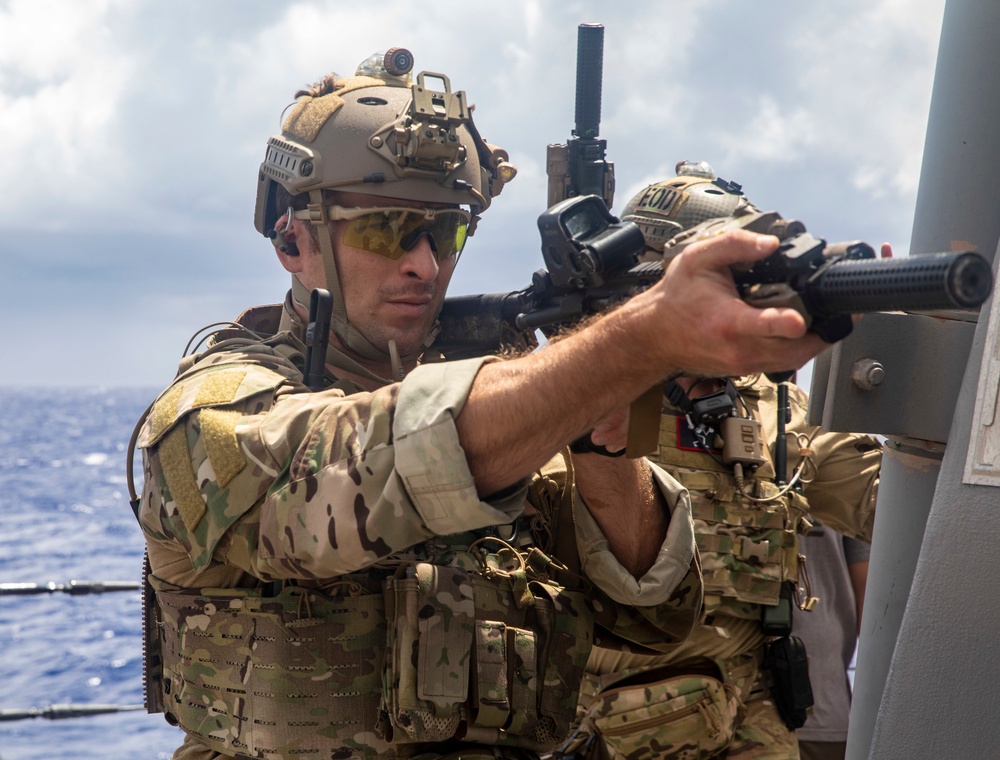 Sailors from USS Abraham Lincoln Conduct a Helicopter Visit, Board, Search and Seizure Exercise with USS Dewey