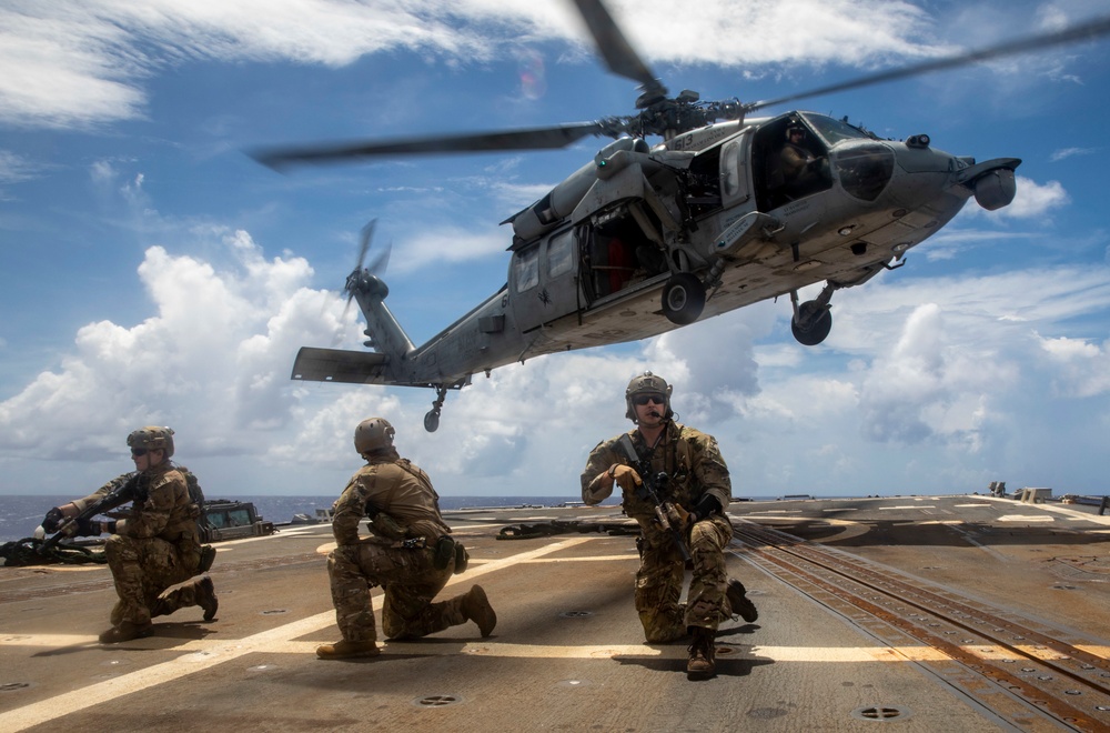 Sailors from USS Abraham Lincoln Conduct a Helicopter Visit, Board, Search and Seizure Exercise with USS Dewey