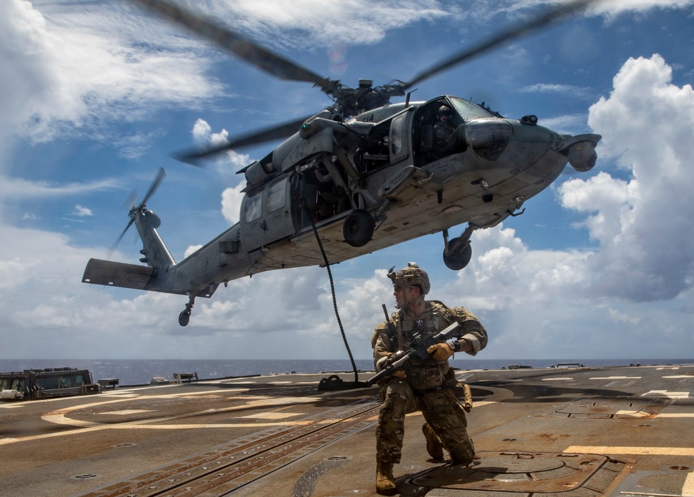 Sailors from USS Abraham Lincoln Conduct a Helicopter Visit, Board, Search and Seizure Exercise with USS Dewey