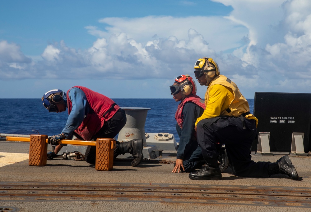 Sailors from USS Abraham Lincoln Conduct a Helicopter Visit, Board, Search and Seizure Exercise with USS Dewey