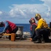 Sailors from USS Abraham Lincoln Conduct a Helicopter Visit, Board, Search and Seizure Exercise with USS Dewey