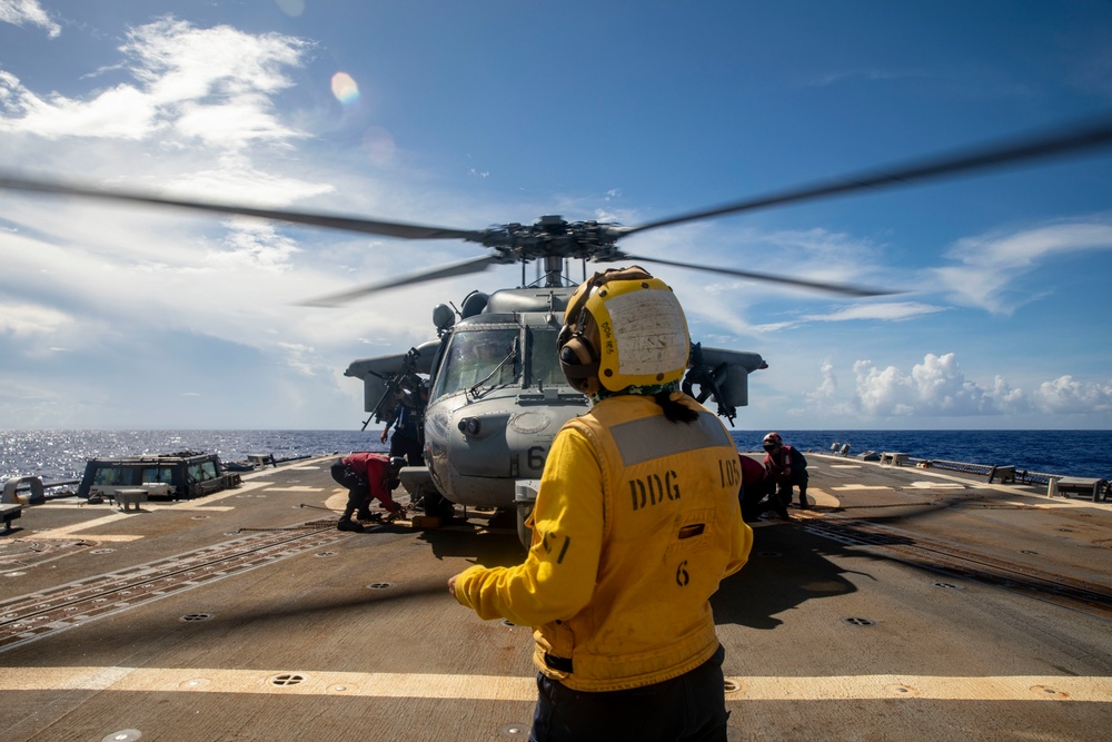 Sailors from USS Abraham Lincoln Conduct a Helicopter Visit, Board, Search and Seizure Exercise with USS Dewey