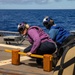 Sailors Aboard USS Dewey (DDg 105) Conduct Vertical Replenishment With USS Mobile Bay (CG 53)