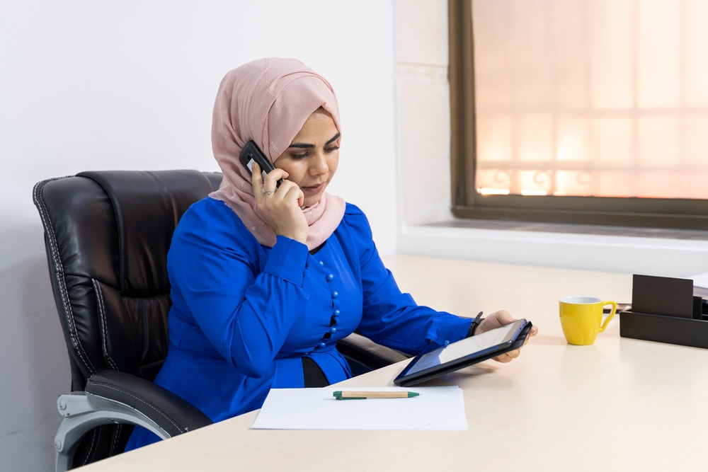 Israa Al-Khatib, preparing to answer telephone calls from COVID-19 patients in Amman, Jordan