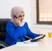Israa Al-Khatib, preparing to answer telephone calls from COVID-19 patients in Amman, Jordan