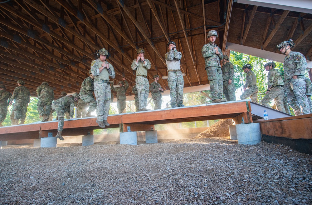 U.S. Army Paratroopers and U.S. Special Tactics Operators train together during RF-A 22-2