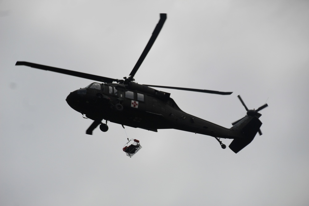 Wisconsin Guard UH-60 Soldiers hold live-hoist, medical-evacuation training at Fort McCoy