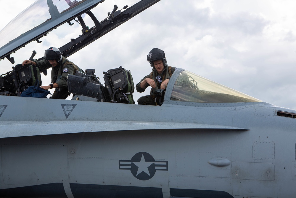 U. S. Marines with VMFA-115 conduct flight operations