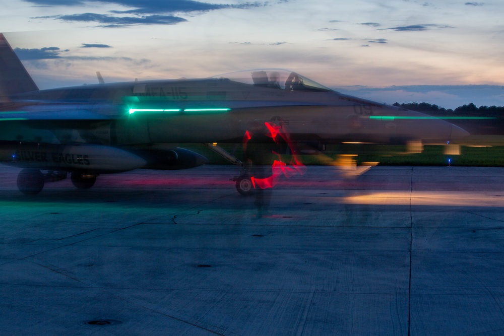 U. S. Marines with Marine Fighter Attack Squadron (VMFA) 115 conduct flight operations