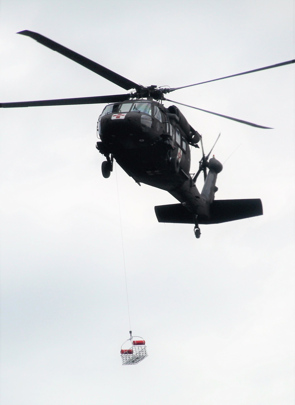 Wisconsin Guard UH-60 Soldiers hold live-hoist, medical-evacuation training at Fort McCoy