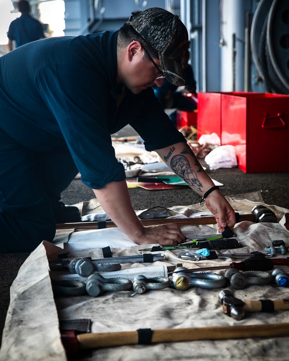 USS George H.W. Bush (CVN 77) Sailor Conducts Inventory