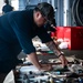 USS George H.W. Bush (CVN 77) Sailor Conducts Inventory