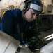 USS George H.W. Bush (CVN 77) Sailor Secures Aircraft