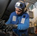 USS George H.W. Bush (CVN 77) Sailor Secures Aircraft