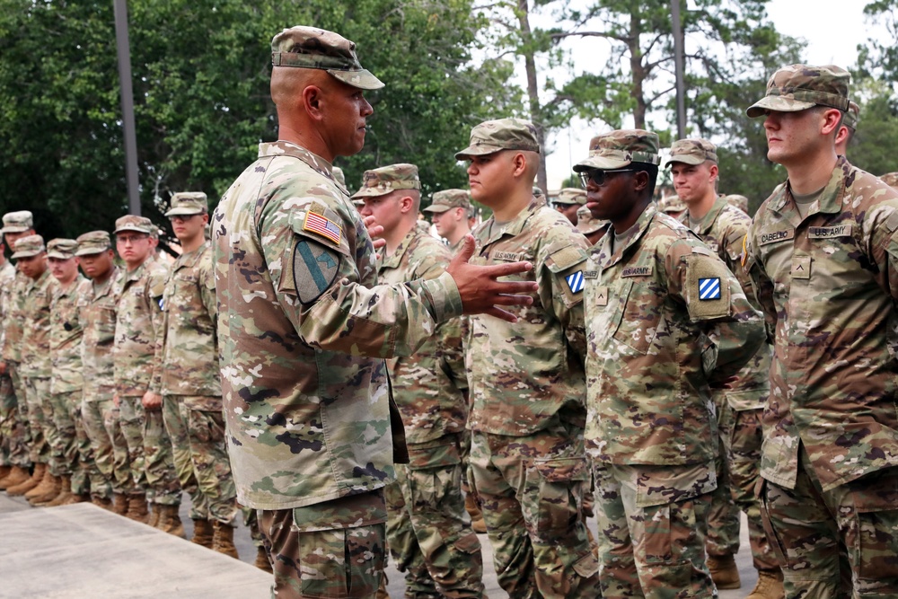 Spartan Brigade welcomes new Soldiers during division patching ceremony