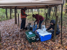 Environmental engineers monitor water quality through groundwater sampling
