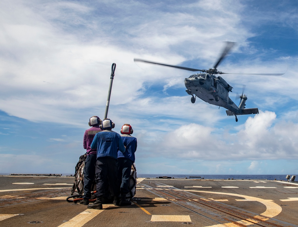 Sailors Aboard USS Dewey (DDg 105) Conduct Vertical Replenishment With USS Mobile Bay (CG 53)