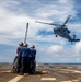 Sailors Aboard USS Dewey (DDg 105) Conduct Vertical Replenishment With USS Mobile Bay (CG 53)