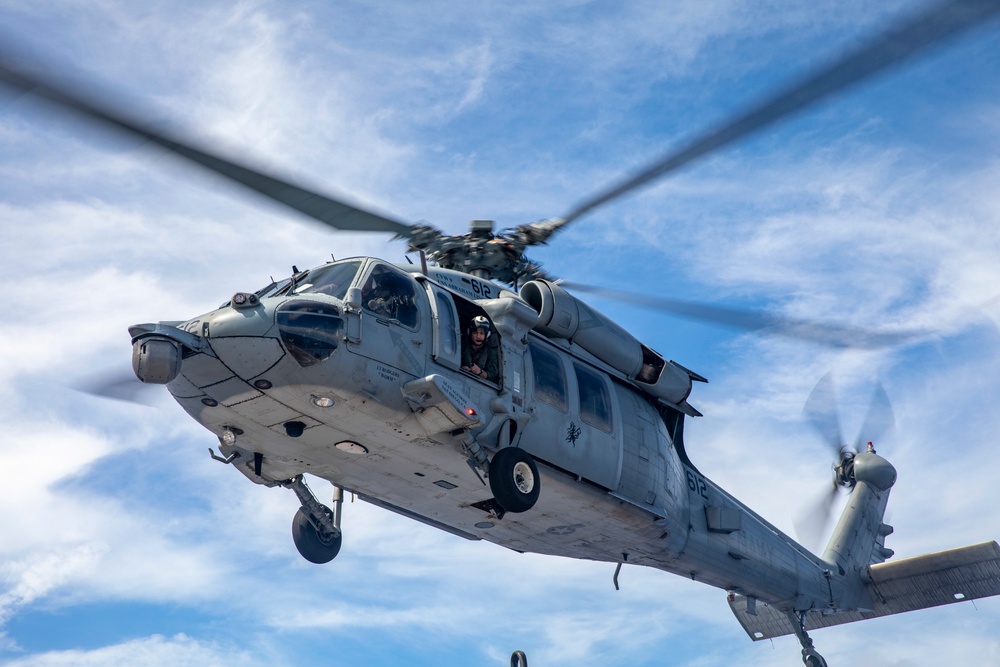 Sailors Aboard USS Dewey (DDg 105) Conduct Vertical Replenishment With USS Mobile Bay (CG 53)