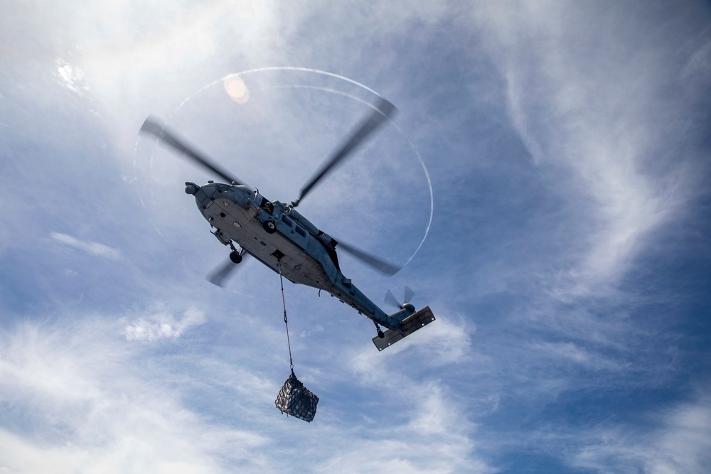 Sailors Aboard USS Dewey (DDg 105) Conduct Vertical Replenishment With USS Mobile Bay (CG 53)