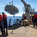 Sailors Aboard USS Dewey Conduct Search and Rescue Training With USS Mobile Bay