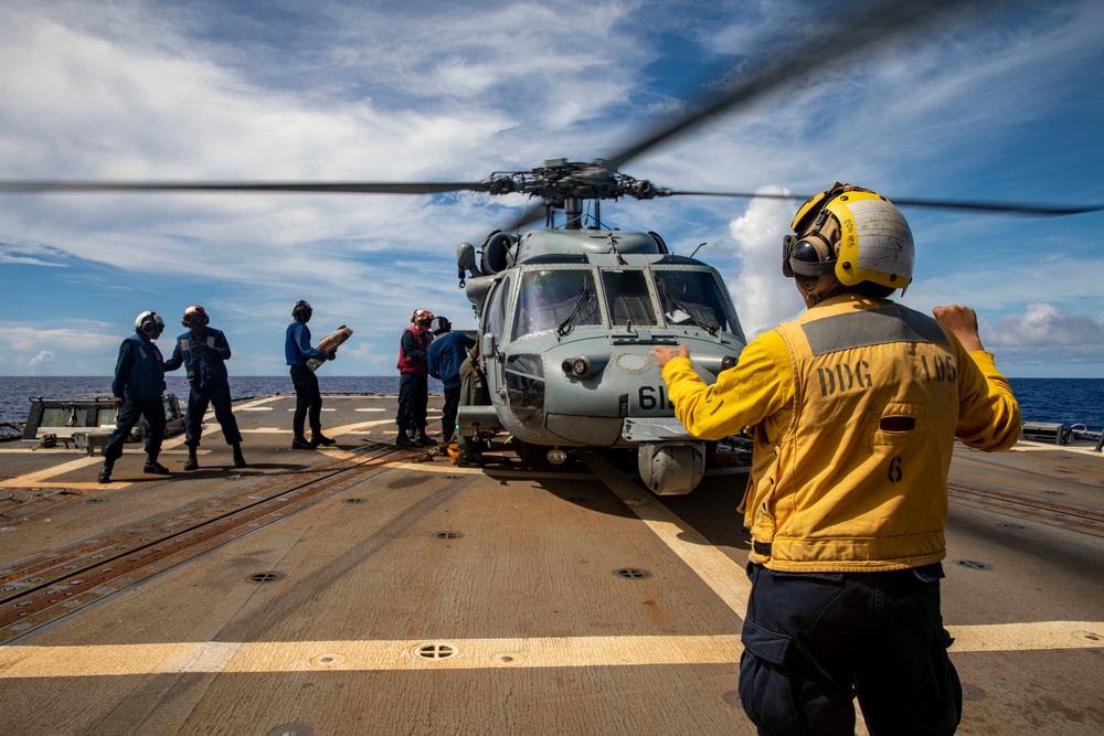 Sailors Aboard USS Dewey (DDg 105) Conduct Vertical Replenishment With USS Mobile Bay (CG 53)