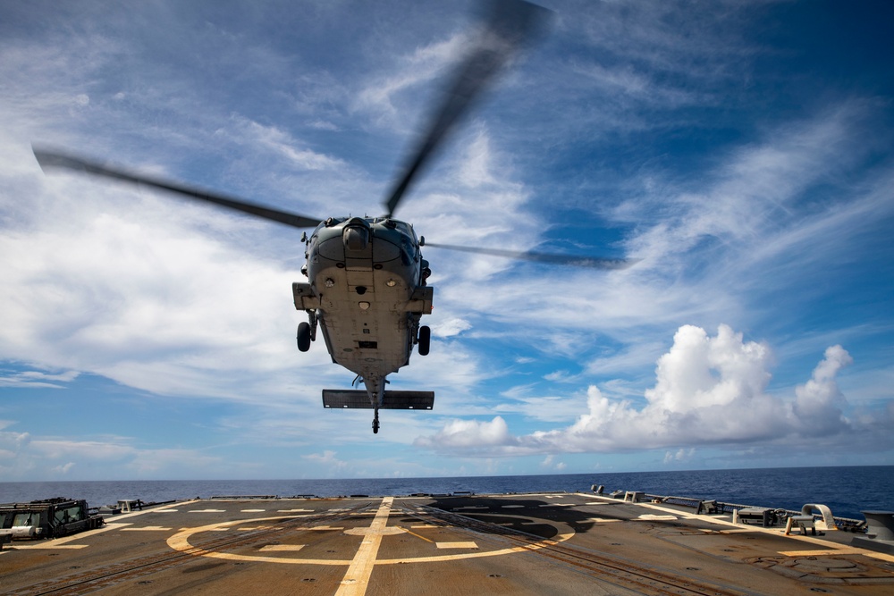 Sailors Aboard USS Dewey (DDg 105) Conduct Vertical Replenishment With USS Mobile Bay (CG 53)