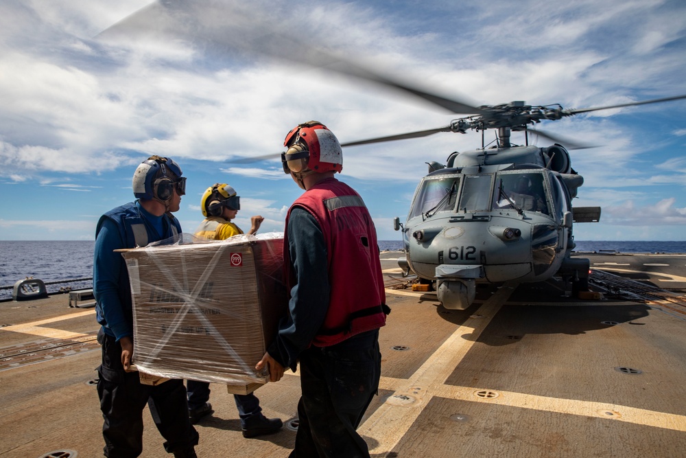 Sailors Aboard USS Dewey (DDg 105) Conduct Vertical Replenishment With USS Mobile Bay (CG 53)