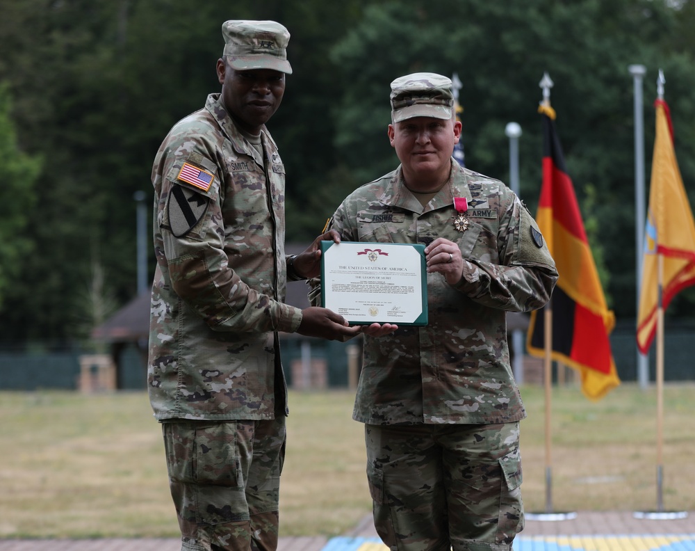 Maj. Gen. James M. Smith awards Col. Charles Fisher with the Legion of Merit