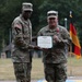 Maj. Gen. James M. Smith awards Col. Charles Fisher with the Legion of Merit