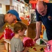 NSA Mid-South Fire Department speaks with families at The Fire Museum of Memphis during Navy Week Memphis