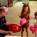 NSA Mid-South Fire Department speaks with families at The Fire Museum of Memphis during Navy Week Memphis