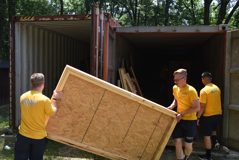 Sailors volunteer at For The Kingdom during Navy Week Memphis