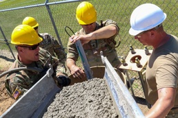 Engineers Install Light Poles at Fort McCoy