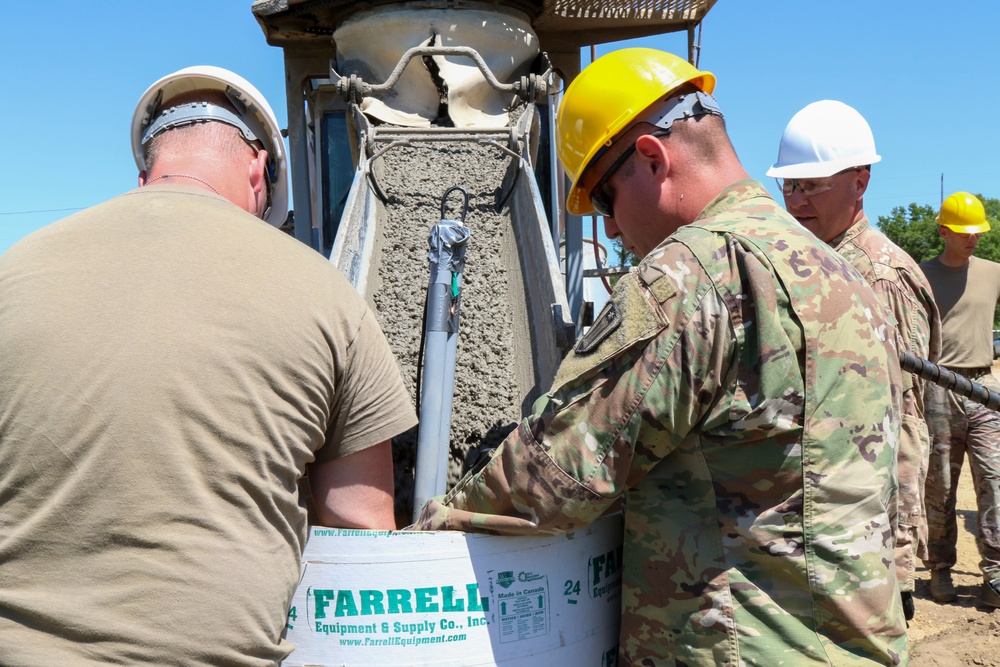 Engineers Install Light Poles at Fort McCoy