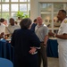 Commander, Navy Personnel Command Socializes with Attendees to a Memphis Navy League reception During Navy Week Memphis