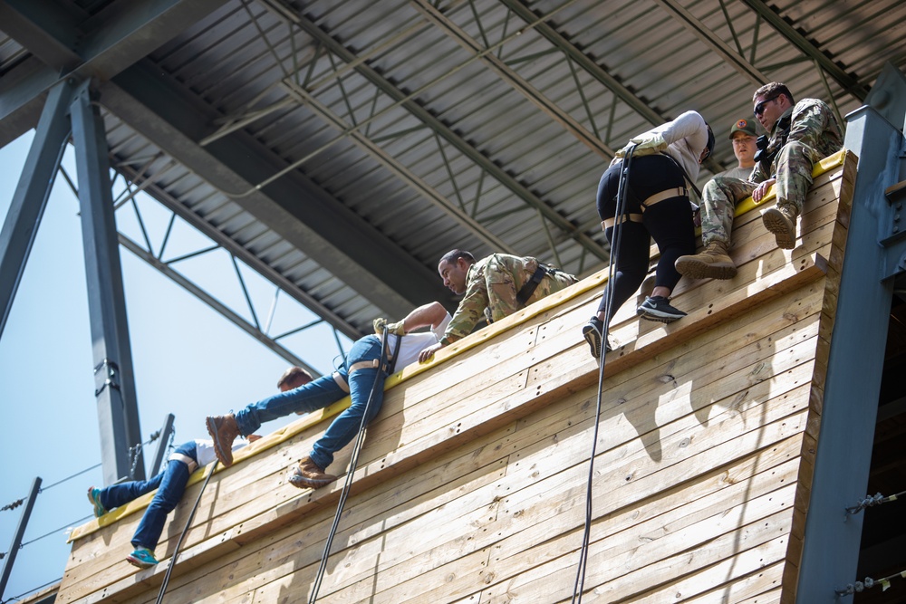 Leadership Oklahoma rappels down Fort Sill tower