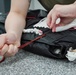 1 SOSS aircrew flight equipment specialists pack life-saving parachutes