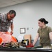 1 SOSS aircrew flight equipment specialists pack life-saving parachutes