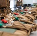 1 SOSS aircrew flight equipment specialists pack life-saving parachutes