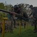 U.S. and French Marines work together on an endurance course