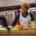 Competitors go plate to plate in food competition