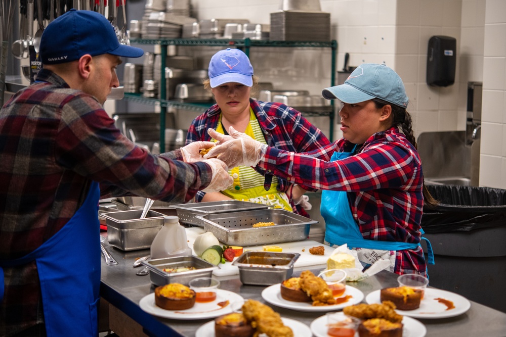 Competitors go plate to plate in food competition