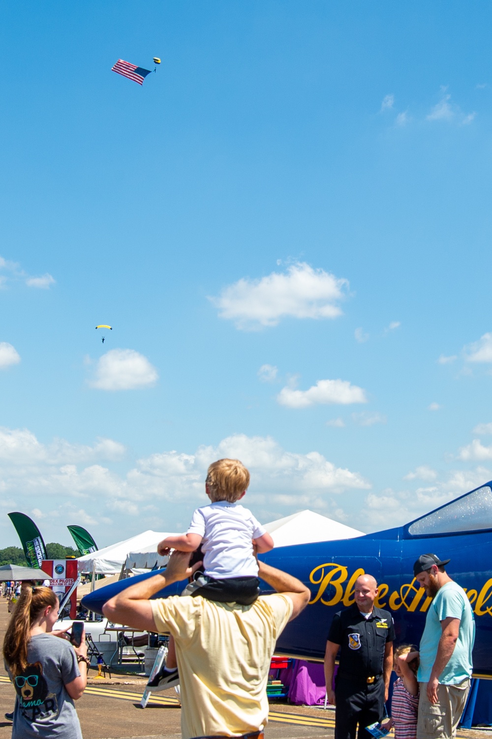 U.S. Navy Parachute Team, the Leap Frogs, conduct a demonstration jump at the Midsouth Airshow during Navy Week Memphis